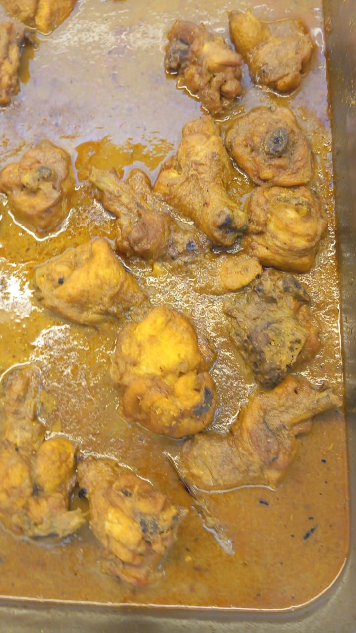 Traditional Chicken Curry at Deshi Bhoj Restaurant